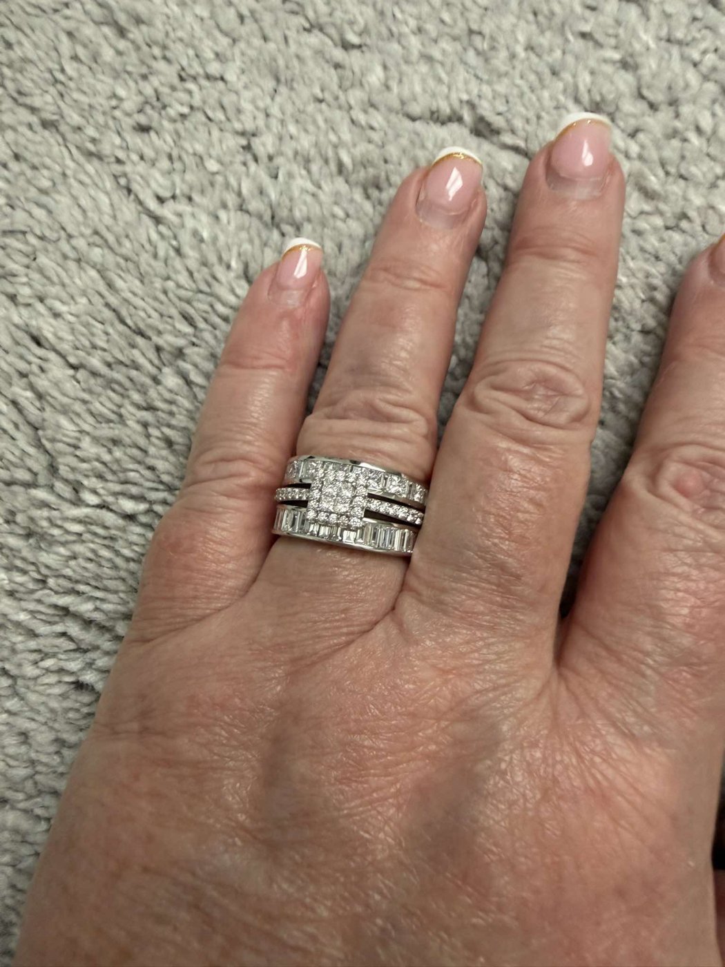 Stacked decorative bands worn on a hand
